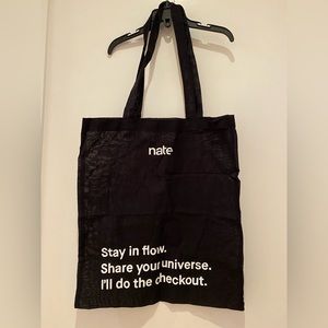 New Nate promo tote bag in black. Lightweight material.